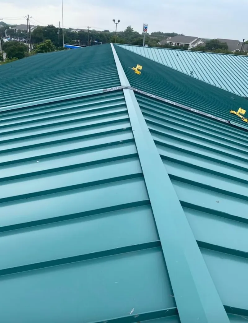Green commercial metal roof ridge and valley for Metal Roof Repair in Edmonds
