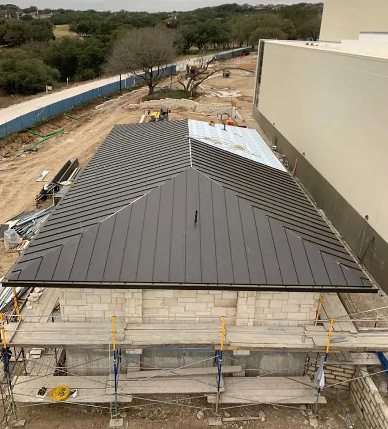 Metal roof new construction with scaffolding in Edmonds